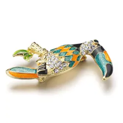 Broche élégante avec oiseau toucan cristallin