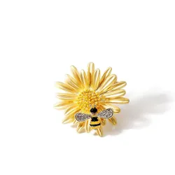 Abe de cristal et marguerite - une broche élégante
