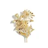 Daisy de cristal - une broche élégante